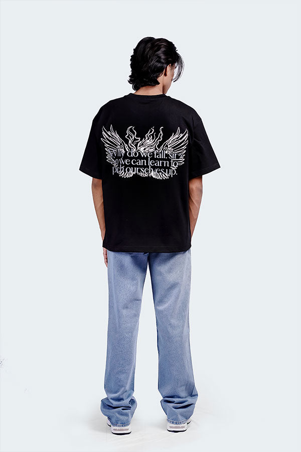 This Black Tee is inspired by the timeless wisdom: “Why do we fall, sir? So we can learn to pick ourselves up.” , available at Cop Underdog In-store and ready to ship.