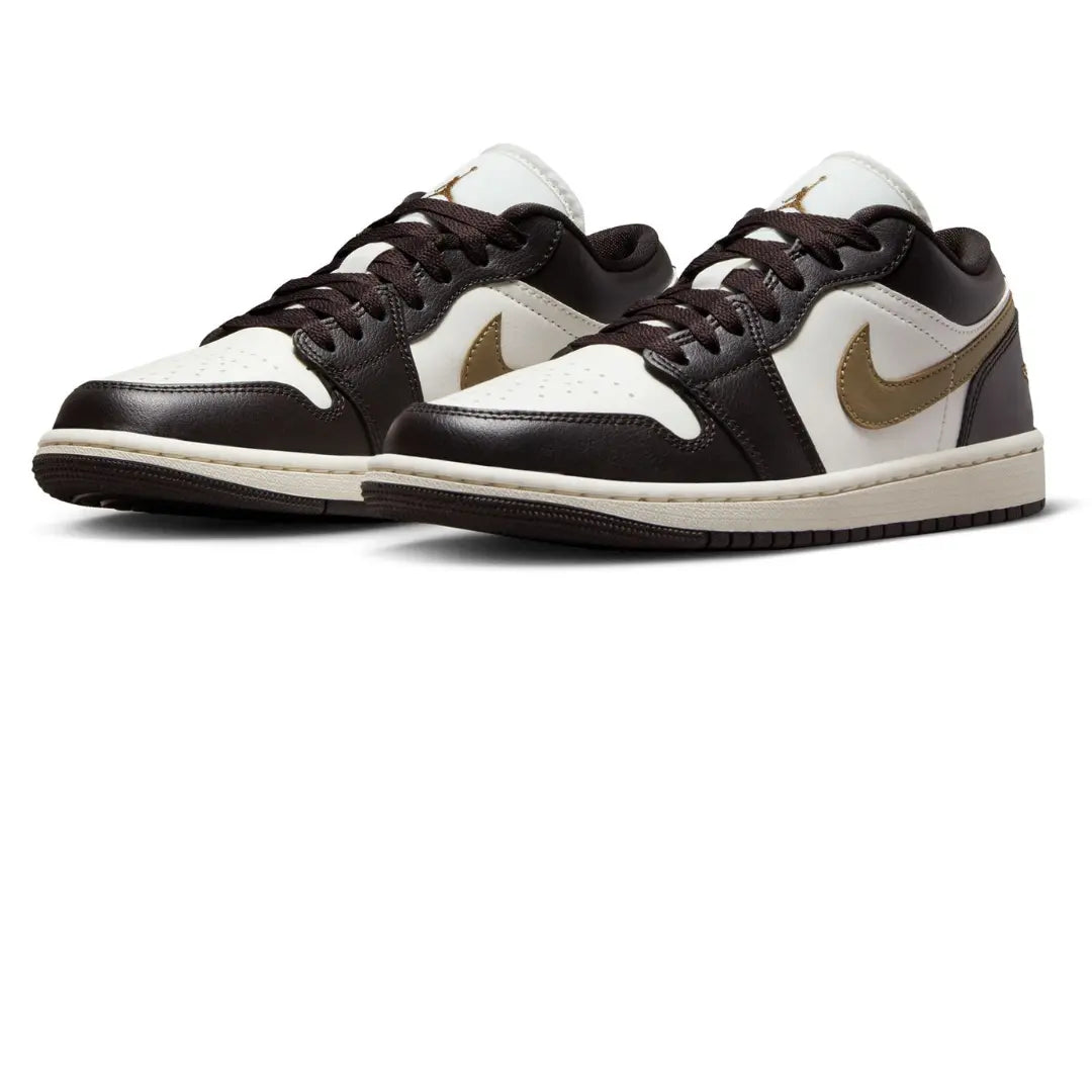 The Jordan 1 Low Shadow Brown (W) is a women’s-exclusive colorway of the retro basketball shoe with a casual appearance. The "Shadow Brown" has a Sail leather base with overlays made of black leather, available at Cop Underdog In-store and ready to ship.