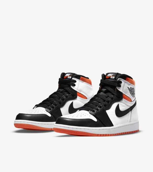 The Air Jordan 1 High Electro Orange, an electrifying edition covers the silhouette with a white and black upper to create a clean make-up before a charged-up colour comes through, available at Cop Underdog In-store and ready to ship.