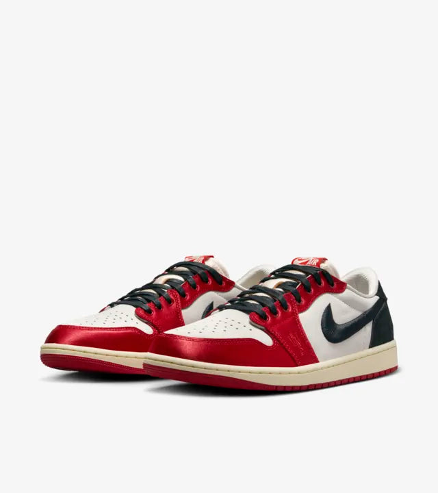 The Air Jordan 1 Low OG Trophy Room Away (Red) pays homage to the legendary Trophy Room, featuring a sleek design in a classic colorway, available at Cop Underdog In-store and ready to ship.