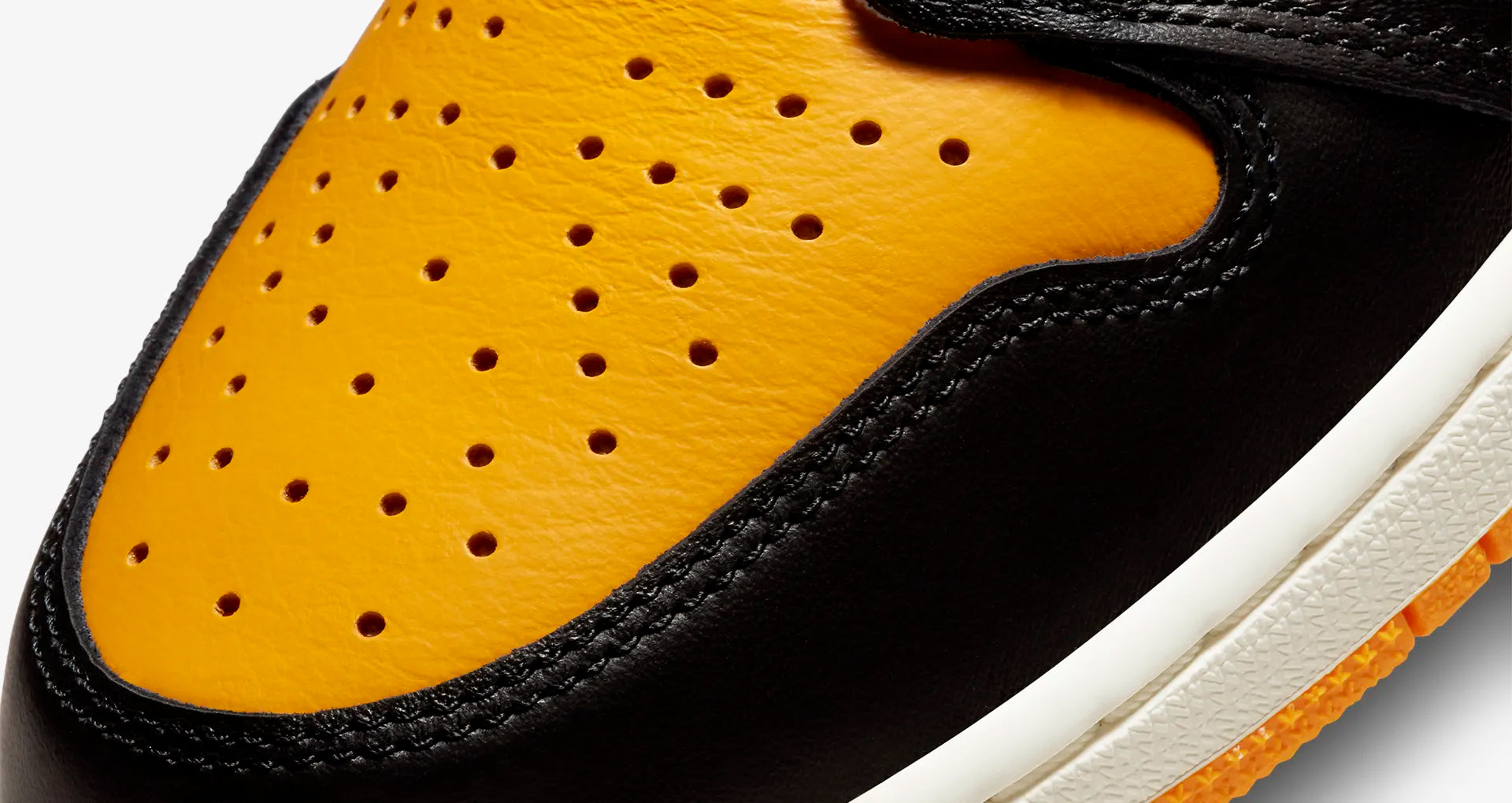 The Air Jordan 1 Retro High OG Yellow Toe also known as Taxi, has uppers made of premium white tumbled leather with yellow toe, heel counter, and ankle panels, available at Cop Underdog In-store and ready to ship.
