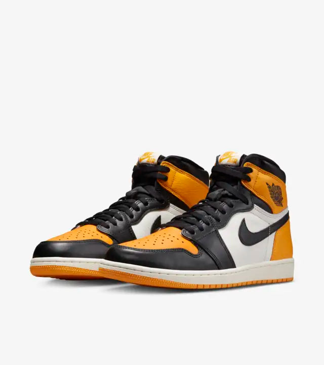 The Air Jordan 1 Retro High OG Yellow Toe also known as Taxi, has uppers made of premium white tumbled leather with yellow toe, heel counter, and ankle panels, available at Cop Underdog In-store and ready to ship.