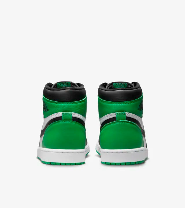 The Air Jordan 1 Retro High Black and Lucky Green is constructed using a leather upper, brought to life with shades of white, black and Lucky Green throughout. Lucky Green Nike branding sits on top of the black tongue and insoles of the sneaker, available at Cop Underdog In-store and ready to ship.