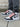 The Air Jordan 1 High OG Stage Haze keeps with the traditional Black Toe aesthetic and has a smooth white leather upper with black overlays and light grey Durabuck heel covers, available at Cop Underdog In-store and ready to ship.