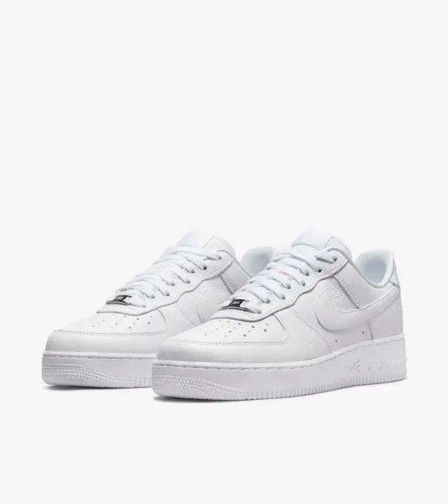 The Nike Air Force 1 Low Drake Nocta Certified Lover Boy is a collaboration with hip-hop artist Drake. The construction of this shoe is extremely understated, with white detailing, everything from the tumbled leather upper to the adjacent laces and lining, available at Cop Underdog In-store and ready to ship.
