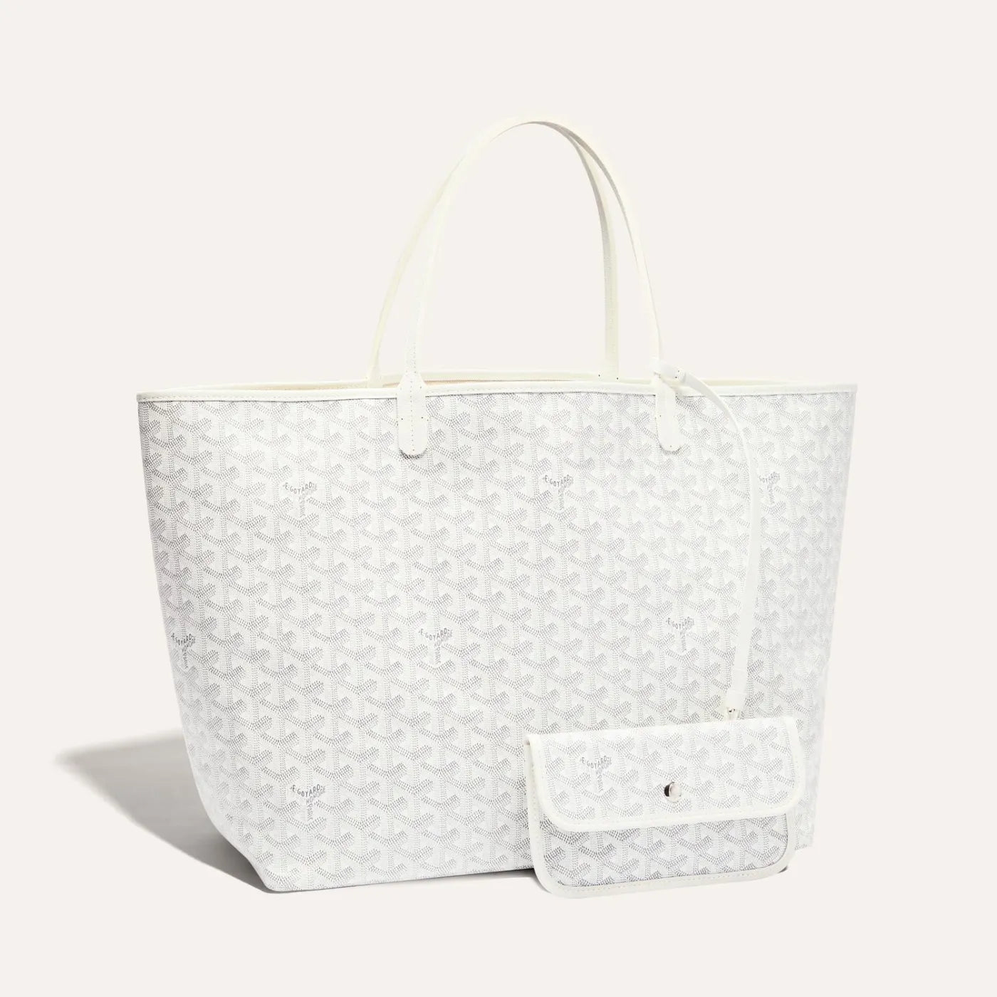 The Saint Louis GM Bag (White) is made from Goyardine and is unlined. It is extremely light and completely reversible. Wear it showing the Goyardine fabric or inside out, showing the linen and cotton mix, available at Cop Underdog In-store and ready to ship.